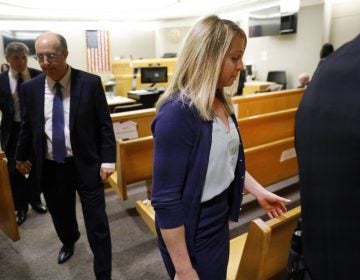 Fired Dallas police officer Amber Guyger leaves the courtroom after a jury found her guilty of murder Tuesday. Guyger shot and killed Botham Jean, an unarmed 26-year-old neighbor in his own apartment last year. She told police she thought his apartment was her own and that he was an intruder. (Tom Fox/Tom Fox/The Dallas Morning News via AP)