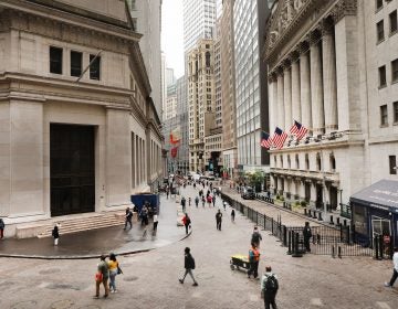 Investors are spending billions of dollars to align their portfolios with their personal values. Above, pedestrians walk past the New York Stock Exchange on June 10. (Spencer Platt/Getty Images)