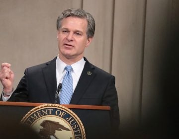 FBI Director Christopher Wray speaks Friday at the Justice Department in Washington, D.C., during a summit on warrant-proof encryption and its impact on child exploitation cases. (Mark Wilson/Getty Images)