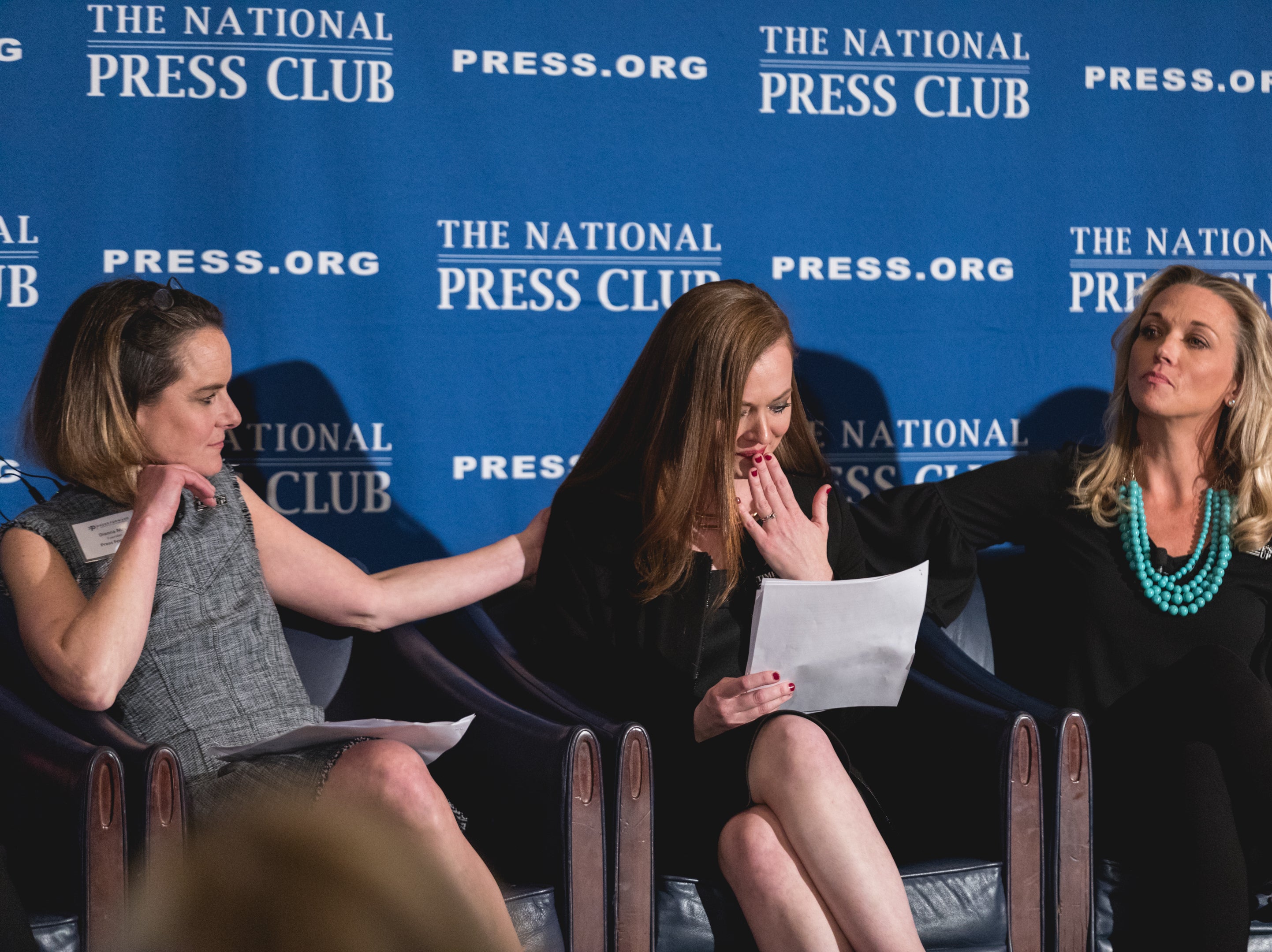 Carolyn McGourty (center) tells her story of sexual harrassment, as panelists Dianna May (left) and Addie Zinone, show their support, at the Press Forward launch event in March 2018. Press Forward is an initiative created to end sexual harassment and assault and create lasting culture change in American newsrooms.