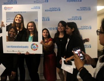 A lighter moment on a serious day: the presentation of a Global Girls' Bill of Rights at the U.N. Left to right: Six of the young women who helped draft the document: Faith Nwando, 17; Djellza Pulatani, 17; Olivia Lombardo, 16; Angelica Morales, 21; Kanchan Amatya, 22; and Vishakha Agrawal, 20. (Yana Paskova for NPR)