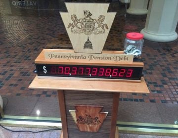 A pension debt clock that sits in the state Capitol's east wing rotunda. Together, Pennsylvania's two public pension systems have roughly $70 billion in unfunded liabilities. (PennLive)