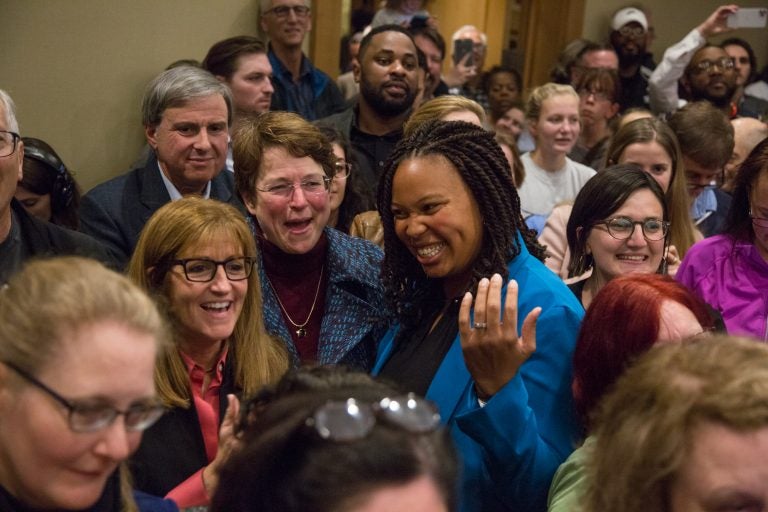 Elaine Paul Schaefer (left center), Christine Reuther, and Monica Taylor celebrate their historic win for the three open seats on the Delaware County Council. (Emily Cohen for WHYY)