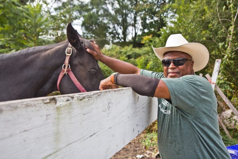 Concrete Cowboys founder Malik Divers and his horse Sunny. (Kimberly Paynter/WHYY)