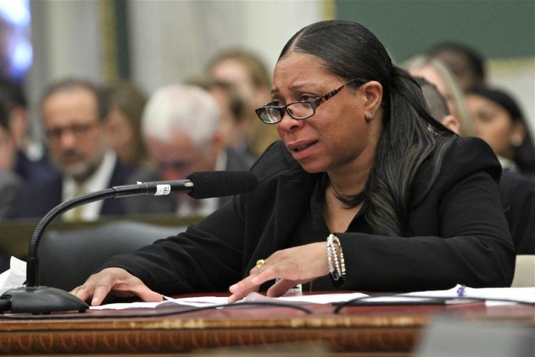 Laron Campbell, a Philadelphia resident who narrowly avoideded eviction with the help of Community Legal Services, testifies during a City Council hearing on a bill that would guarantee legal counsel for evictees. (Emma Lee/WHYY)