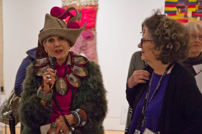 Artist Debra Rapoport speaks about her work at the Off the Wall: American Art to Wear Exhibit. (Kimberly Paynter/WHYY)