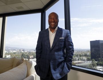 Comedian and media mogul Byron Allen poses for a picture Thursday, Sept. 5, 2019, in Los Angeles. The Supreme Court will hear arguments Nov. 13 in a $20 billion lawsuit Allen filed against Comcast, with the outcome also affecting a $10 billion case he filed against Charter Communications. (Chris Carlson/AP Photo)