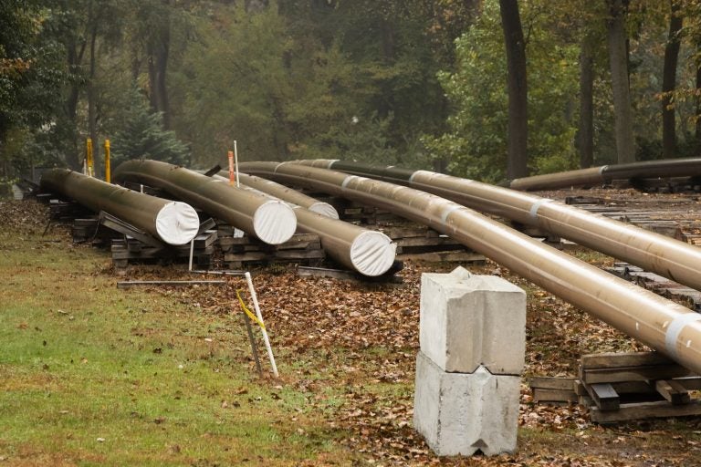 In this Oct. 22, 2019 file photo, pipes lay along a construction site on the Mariner East pipeline in a residential neighborhood in Exton, Pa. (Matt Rourke/AP Photo)