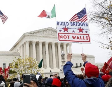 People rally outside the Supreme Court as oral arguments are heard in the case of President Trump's decision to end the Obama-era, Deferred Action for Childhood Arrivals program (DACA), Tuesday, Nov. 12, 2019, at the Supreme Court in Washington. (Jacquelyn Martin/AP Photo)