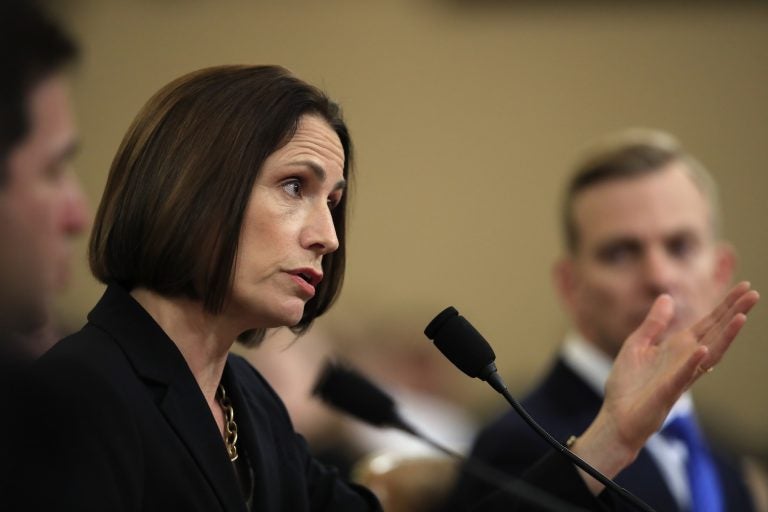 Former White House national security aide Fiona Hill, and David Holmes, a U.S. diplomat in Ukraine, right, testify before the House Intelligence Committee on Capitol Hill in Washington, Thursday, Nov. 21, 2019, during a public impeachment hearing of President Donald Trump's efforts to tie U.S. aid for Ukraine to investigations of his political opponents. (Manuel Balce Ceneta/AP Photo)