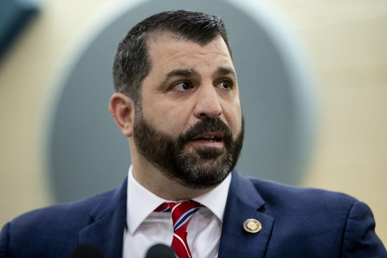 Rep. Mark Rozzi, D-Berks, speaks before Pennsylvania Gov. Tom Wolf signs legislation into law at Muhlenberg High School in Reading, Pa., Tuesday, Nov. 26, 2019. (AP Photo/Matt Rourke)