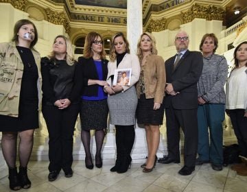 Victim advocate Jennifer Storm, second left, joins survivors of child sexual abuse including Patty Fortney-Julius, third left, and Mary McHale, second right, waiting for a news conference in the Pennsylvania Capitol, in Harrisburg, Pa. (Marc Levy/AP Photo)