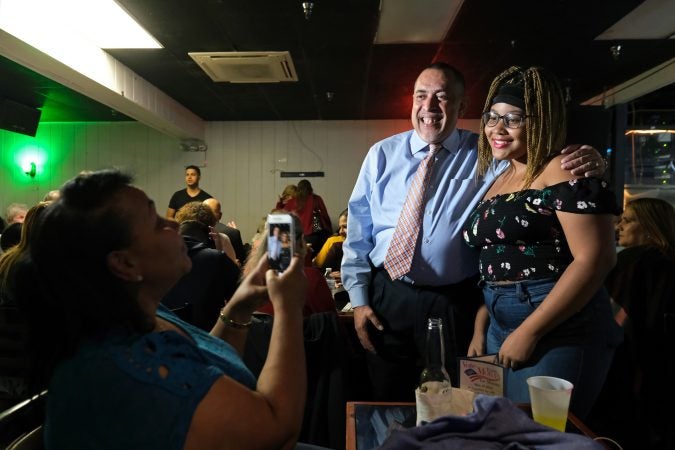 Moran poses for a photo with Melanie Taravez, right, as supporters gathered for a campaign event. (Matt Smith for Keystone Crossroads)
