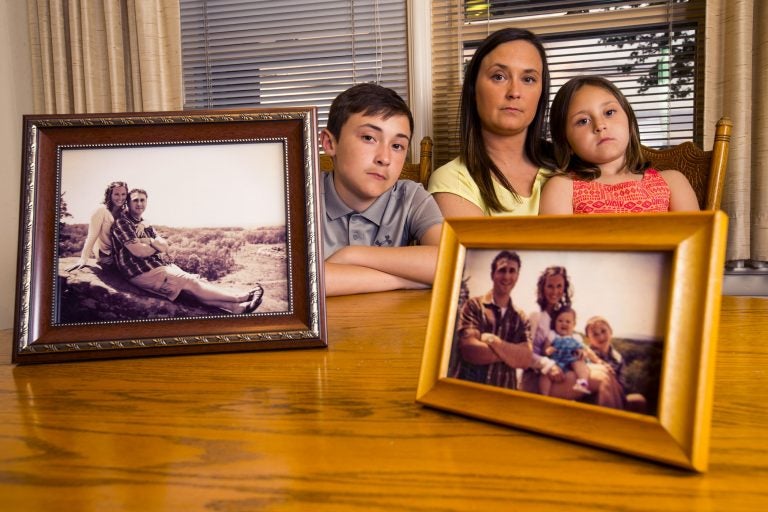 Suzanne Yorty lost her fiancee, partner, and father of her children, Ryan Myers, to a drug overdose in 2016. She is shown with her children, Jarryn, 12, and Sophia, 6.  Ryan would have turned 32 on May 15. On the table are photos taken on Ryan's 27th birthday in 2013. The family was on an outing in Gettysburg. They are shown in their suburban York home.   (Charles Fox / The Philadelphia Inquirer)