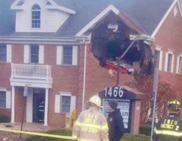 Police say a luxury sports car crashed into the second floor of a Jersey Shore professional office building, killing two people. (Courtesy of Kiefer Armbrecht via Jersey Shore Hurricane News/Facebook). 