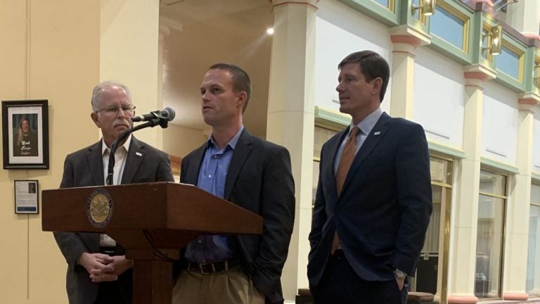 Lead plaintiff David Schaszberger speaks at a Capitol press conference, flanked by one of his attorneys and Mark Janus, the Illinois plaintiff at the heart of the Janus decision that stopped public sector unions from collecting dues from non-members. (Katie Meyer/WITF)