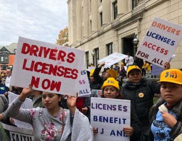 Hundreds rallied outside the Statehouse to push lawmakers to join 13 other states and Washington, D.C. in extending licenses to undocumented immigrants. (Joe Hernandez/WHYY)