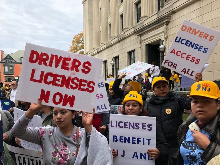 Hundreds rallied outside the Statehouse to push lawmakers to join 13 other states and Washington, D.C. in extending licenses to undocumented immigrants. (Joe Hernandez/WHYY)