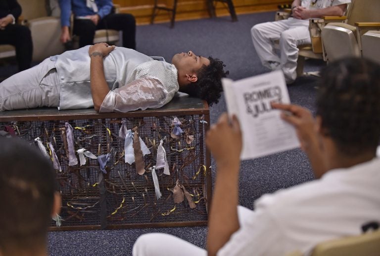 Delaware Shakespeare actor Wilfredo Amill plays the part of Romeo during a performance of Romeo & Juliet held at the Howard R. Young Correctional Institution in Wilmington on Tuesday, November 12, 2019. (Butch Comegys for WHYY)