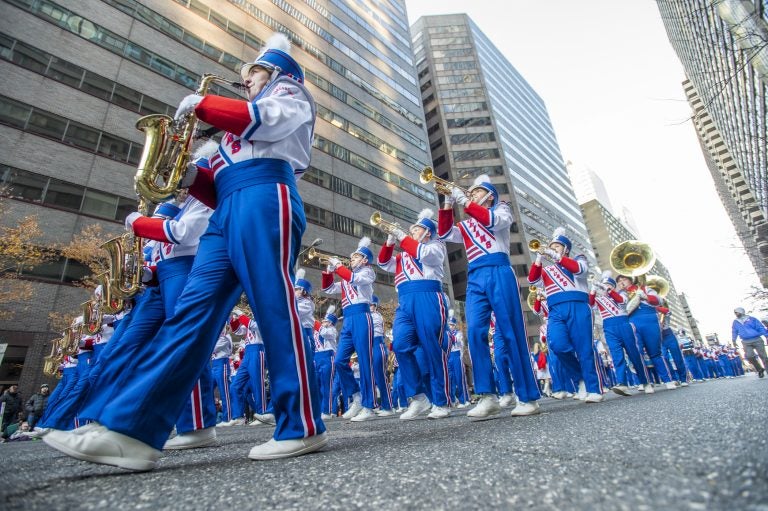 This 2019 photo shows The Morgantown West Virginia High School Marching Band marches along John F Kennedy Blvd during the 100th Philadelphia Thanksgiving Day Parade. (Jonathan Wilson for WHYY)