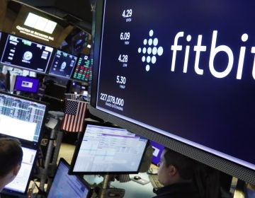 Fitbit, a pioneer in wearable fitness trackers, is being acquired by Google for $2.1 billion. (Richard Drew/AP Photo)