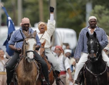 Volunteers participate in a reenactment of what is thought to be the largest slave rebellion in U.S. history in LaPlace, La., on Friday. (Gerald Herbert/AP Photo)