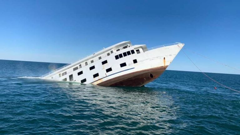 The 215-foot-long cruise ship American Glory slips below the surface of the Atlantic Ocean off the Delaware coast on Monday. The ship will join hundreds of subway cars and other items to become part of the Redbird Inshore Artificial Reef. (Courtesy Chris Ragni)