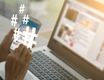 News outlets sometimes use hashtags to promote their stories. (13_Phunkod/Shutterstock.com)