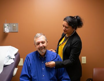 Geriatric oncologist Supriya Gupta Mohile meets with patient Jim Mulcahy at Highland Hospital in Rochester, N.Y. 