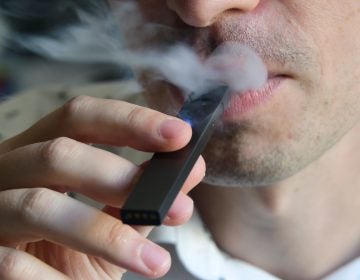 Even as the popularity of e-cigarettes exploded — with unknown health risks — the federal government was slow to regulate vaping companies. (Eva Hambach/AFP via Getty Images)