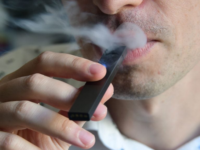 Even as the popularity of e-cigarettes exploded — with unknown health risks — the federal government was slow to regulate vaping companies. (Eva Hambach/AFP via Getty Images)