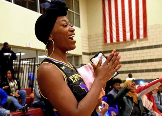 At a November 10 game against the Jersey Express, Camden Monarch dance coach Cherise Corn cheers for the team.  (April Saul for WHYY)