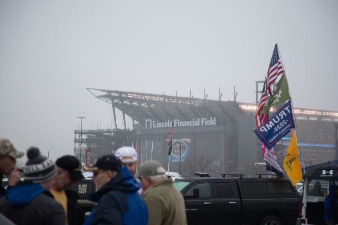 There was the occasional Trump 2020 banner amid team flags at the tailgates, and the president led the coin toss. But patriotism was the point, many said. (Emily Cohen for WHYY)