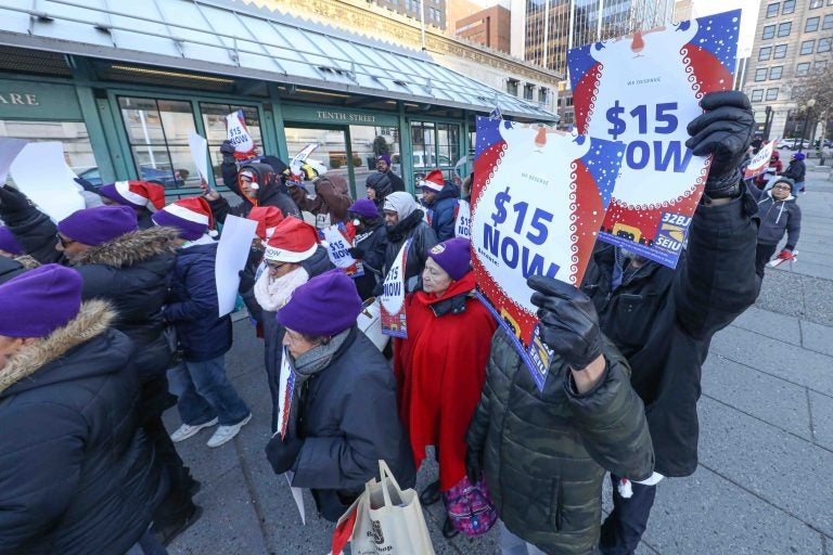 Cleaning workers protested for a higher minimum wage at Rodney Square Thursday, Dec. 19, 2019, in Wilmington, Del. (Saquan Stimpson for WHYY)