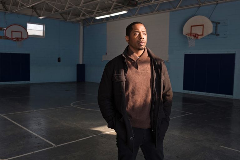 Paul Collins-Hackett works at Youth Opportunity Office in Albany, N.Y.  Collins-Hackett draws on his own personal or family struggles to help young people get through theirs. (Richard Beaven for NPR)