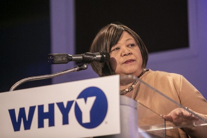 WHYY Vice President for News and Civic Dialogue Sandra Clark gives opening remarks before a talk with Robert Costa at WHYY on Saturday, December 7.  (Miguel Martinez/WHYY)