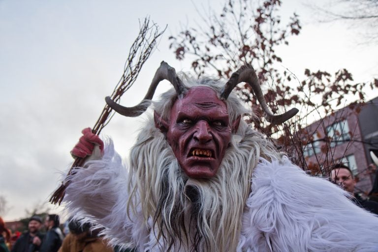 Graydon Dunkelberger studied abroad in Austria where he learned about Krampus. His was was hand carved in Austria. (Kimberly Paynter/WHYY)