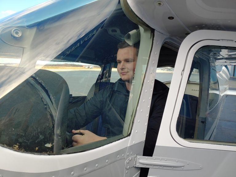 Nathan Stone, 18, is a student at FlyGATEWAY at the New Castle Airport in Delaware. The accelerated flight program wants to offer scholarships to make the pilot career more accessible. (Zoë Read/WHYY)