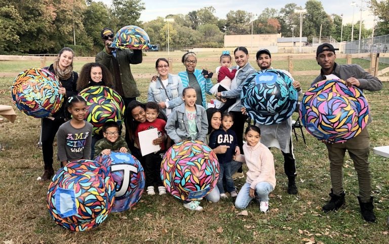 Residents gathered in Juniata to paint the Community Cans. (Courtesy of the Zero Waste and Litter Cabinet)