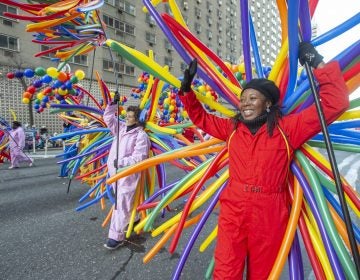 Volunteers wearing balloons lead Philadelphia's 100th Thanksgiving Day Parade. (Jonathan Wilson for WHYY)