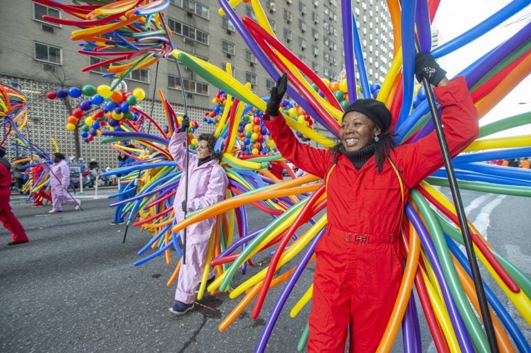 Volunteers wearing balloons lead Philadelphia's 100th Thanksgiving Day Parade. (Jonathan Wilson for WHYY)