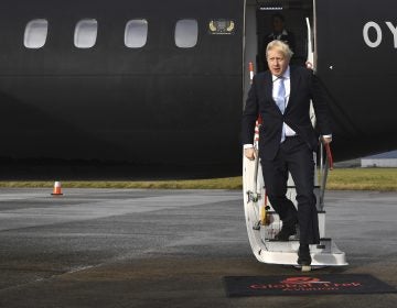 Britain Brexit Election Britain's Prime Minister Boris Johnson arrives at Cardiff Airport while on the General Election campaign trail in Wales, Wednesday, Dec. 11, 2019. Britain goes to the polls on Dec. 12. (Ben Stansall/Pool Photo via AP)