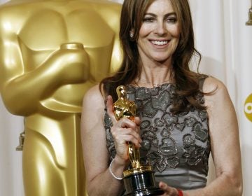 Director Kathryn Bigelow poses backstage with the Oscar for best achievement in directing for 