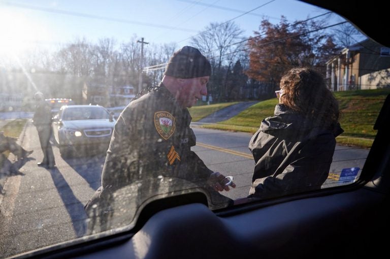 Malinda Clatterbuck is arrested by Uwchlan Township police. (David Parry of outsidetheimage.com)