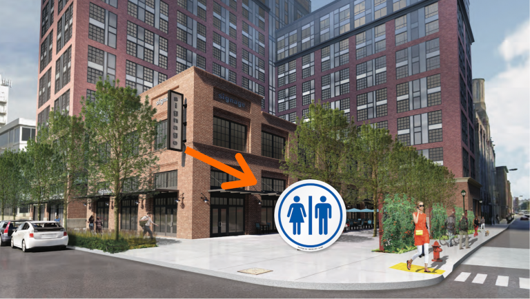A rendering of a complex planned for North Broad, near the Rail Park. Neighbors want the developer to put a public bathroom in the project's public plaza. (Courtesy of Toll Brothers/Barton Partners Architects/PlanPhilly)