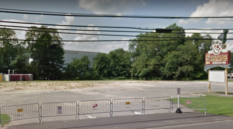 Officials say a clown sign that has smiled on motorists at a now-demolished New Jersey drive-in for two-thirds of a century will be preserved. (Google image) 