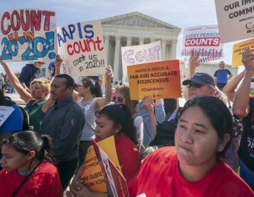 Demonstrators against the Trump administration's push to add a citizenship question to the 2020 census rally outside the U.S. Supreme Court in Washington, D.C., in April. (J. Scott Applewhite/AP)