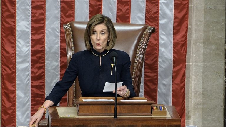 House Speaker Nancy Pelosi, D-Calif., announces the passage of the first article of impeachment, abuse of power, against President Trump by the House of Representatives on Wednesday. (House Television via AP)