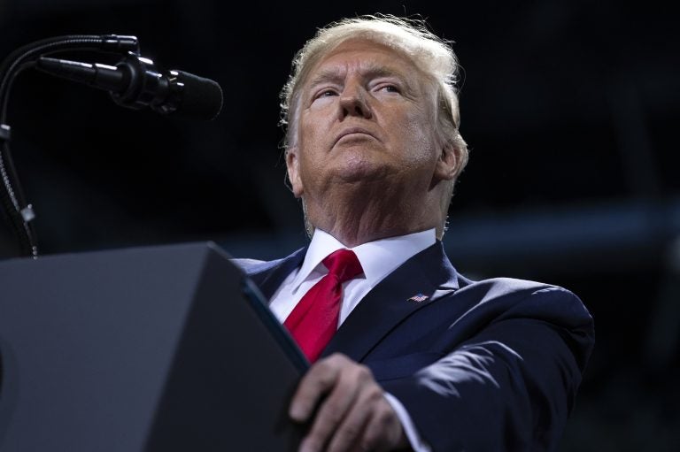 President Trump speaks during a campaign rally in Michigan, where he came out swinging as the House voted to impeach him on Wednesday. (Evan Vucci/AP Photo)
