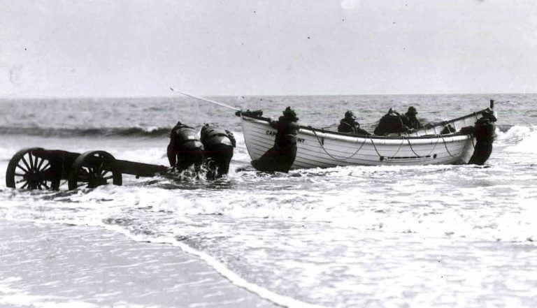 A surf boat and rescuers during a drill at Cape May in about 1915. (U.S. Lifesaving Service Heritage Association)